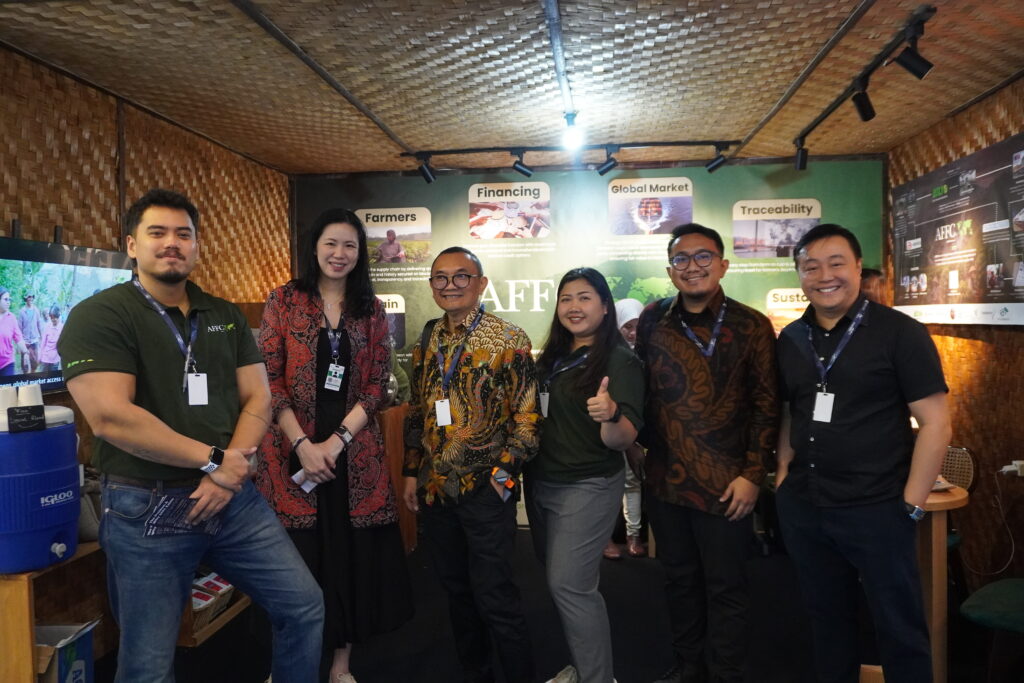 AFFC and ASLI Pangan representatives engaging with visitors